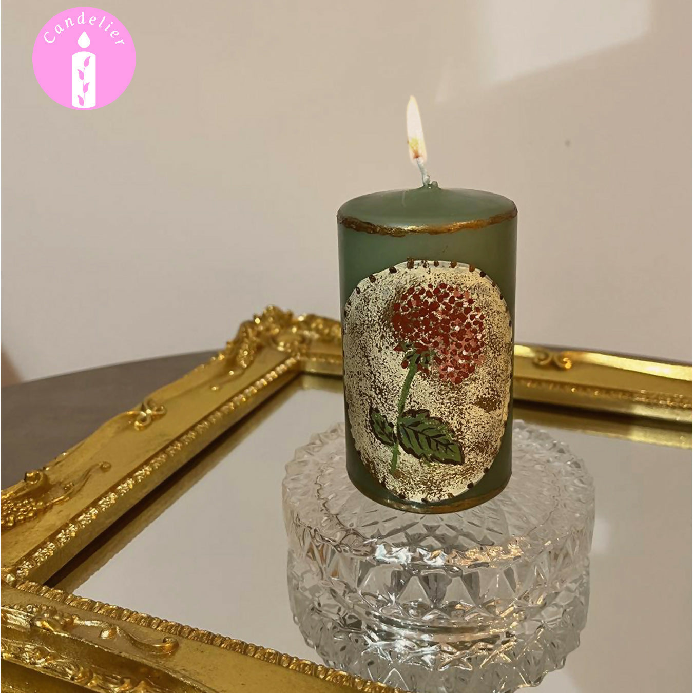 Green Candle with Floral Design
