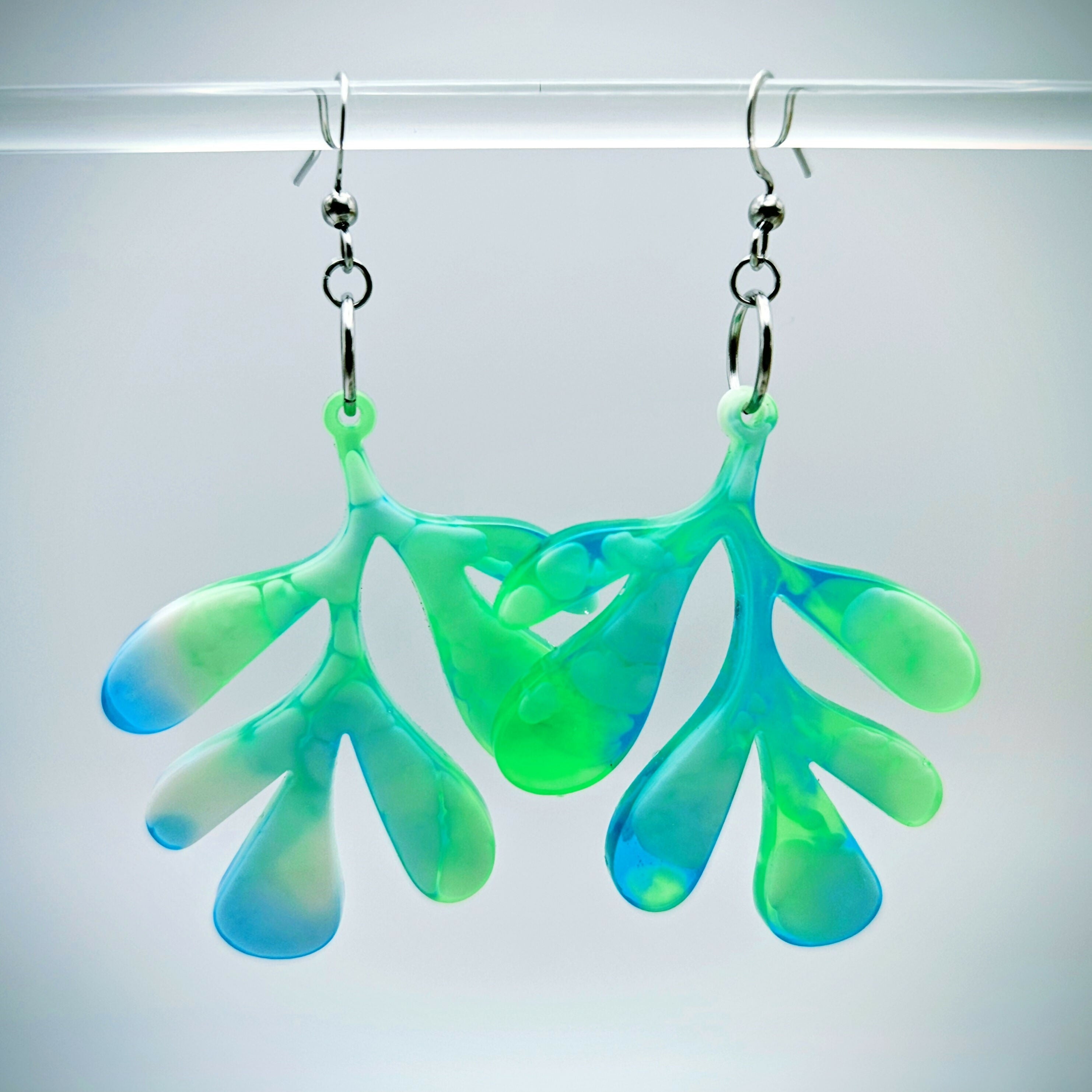 HANDMADE RESIN EARRINGS IN FUN, BOLD LEAF DESIGN.