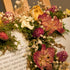 Floral Arrangement on Wooden Easel