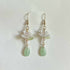 White Lotus Flower Earrings With Green Teardrop Gold