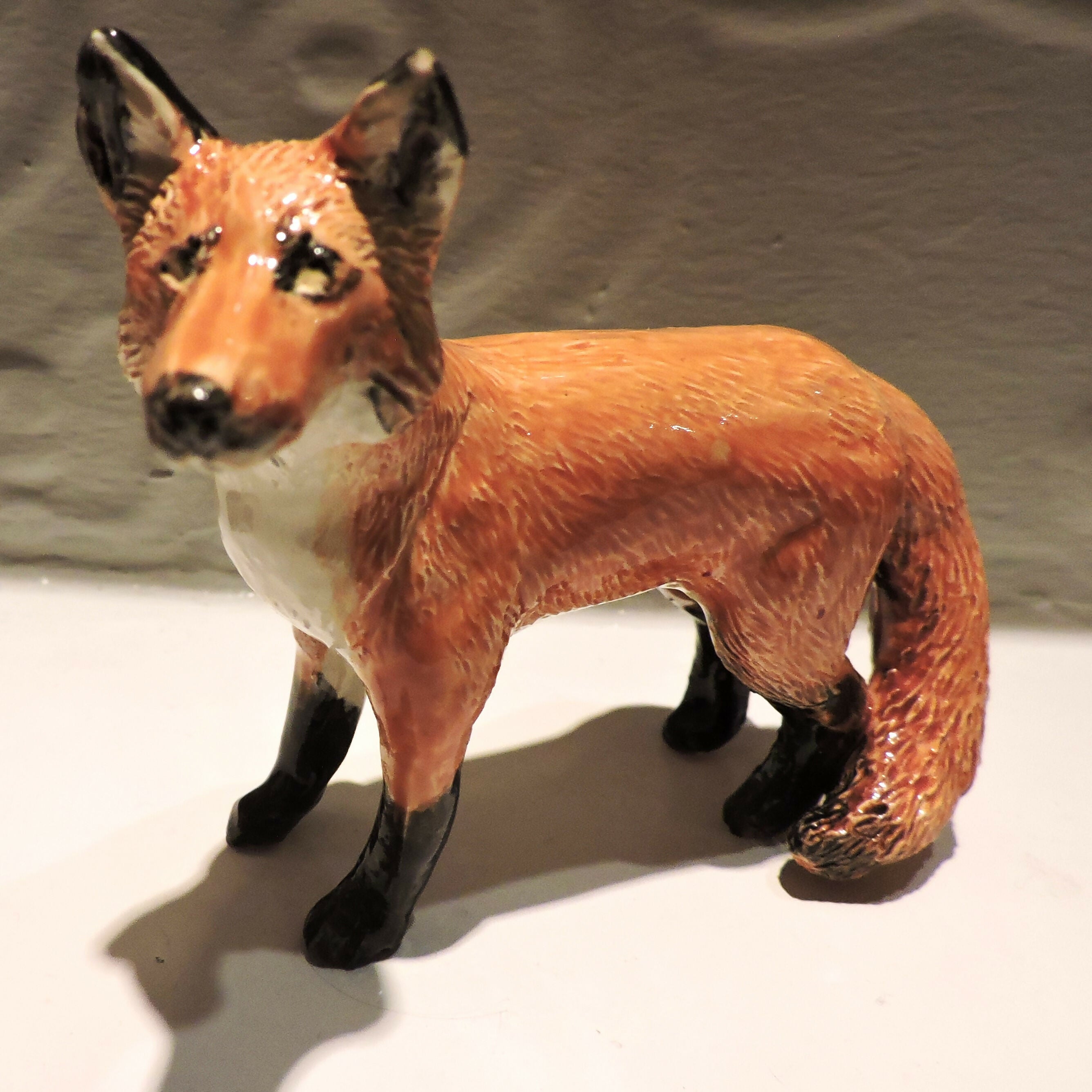 Ceramic standing fox sculpture