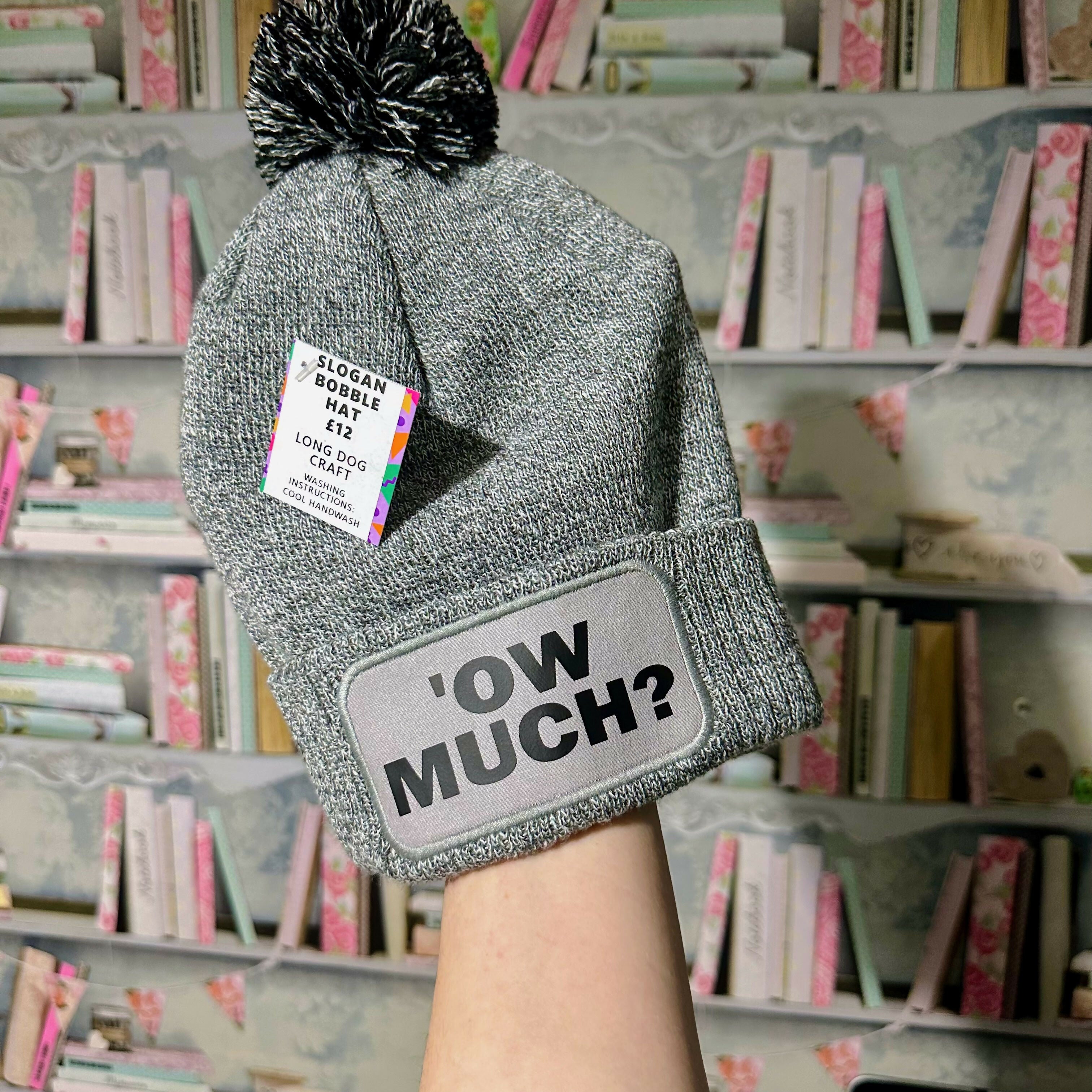 Ow Much Cuffed Rectangular Patch Bobble Hat