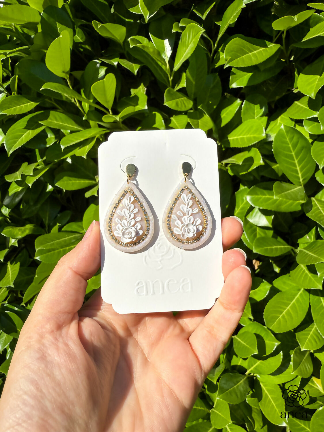 Floral Teardrop Earrings with Rhinestone Detail in Opal