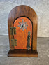 Handcrafted round arch opening wooden fairy door.
