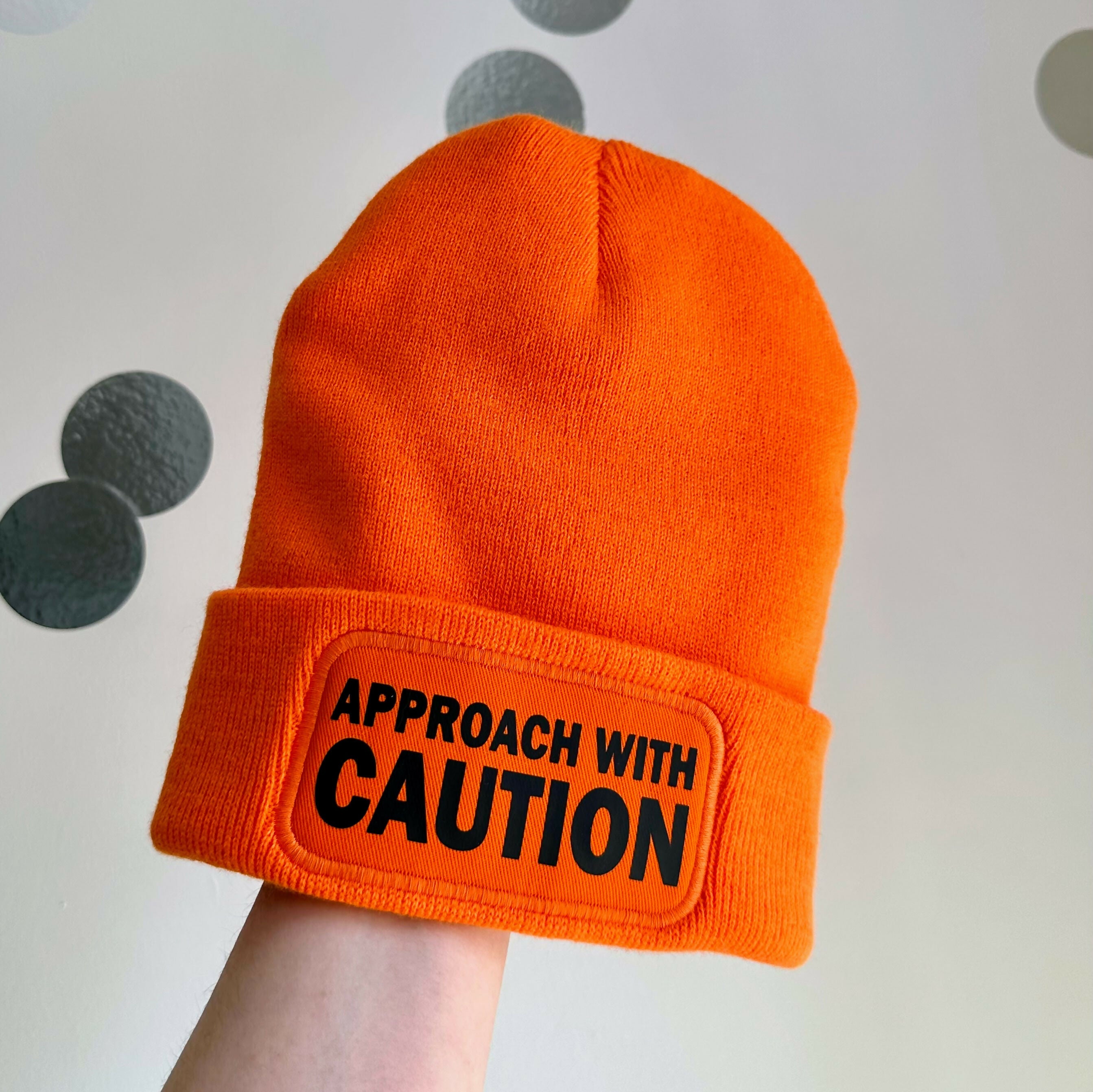 Approach With Caution Cuffed Rectangular Patch Beanie Hat