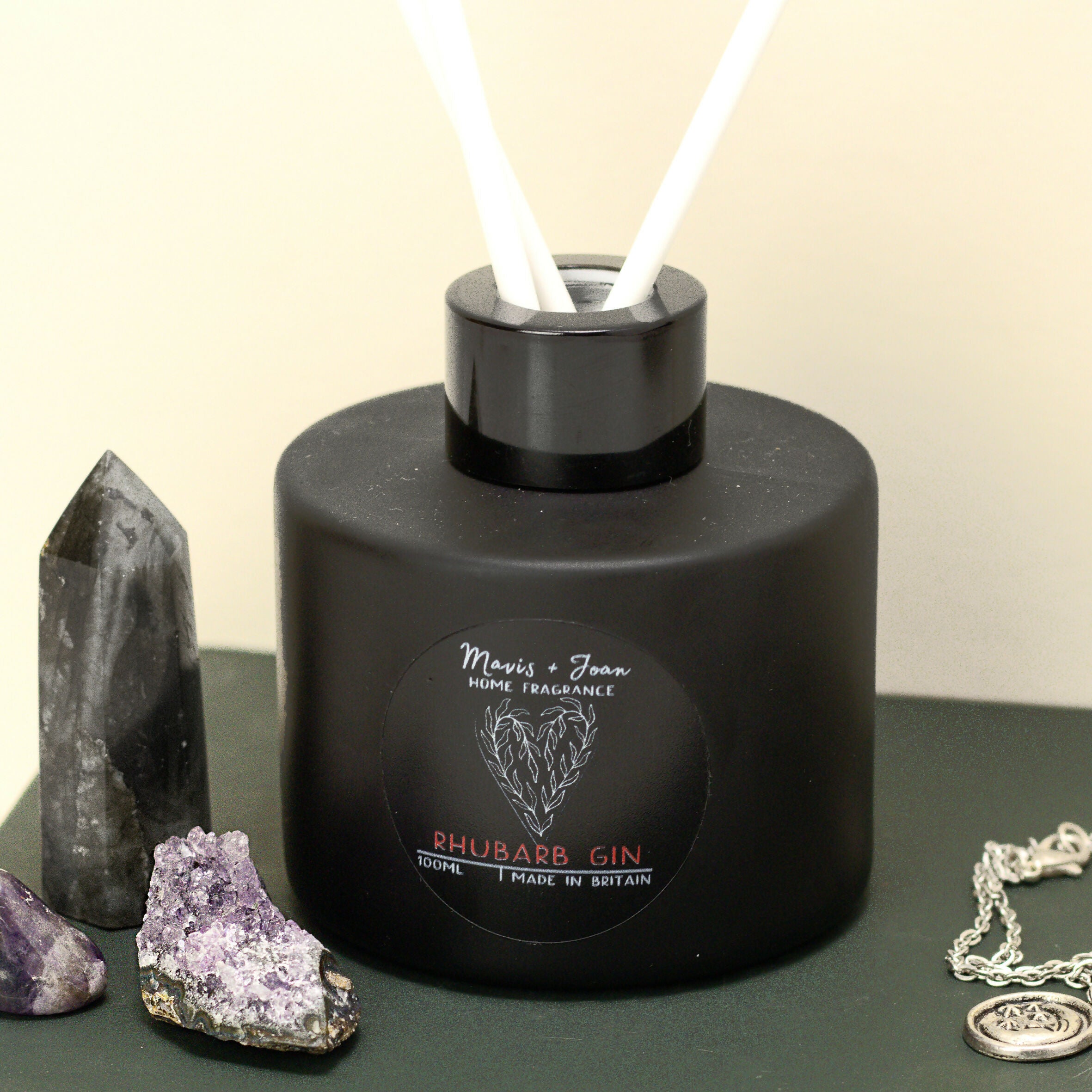 Reed Diffuser with black glass bottle and white reeds