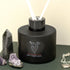 Reed Diffuser with black glass bottle and white reeds