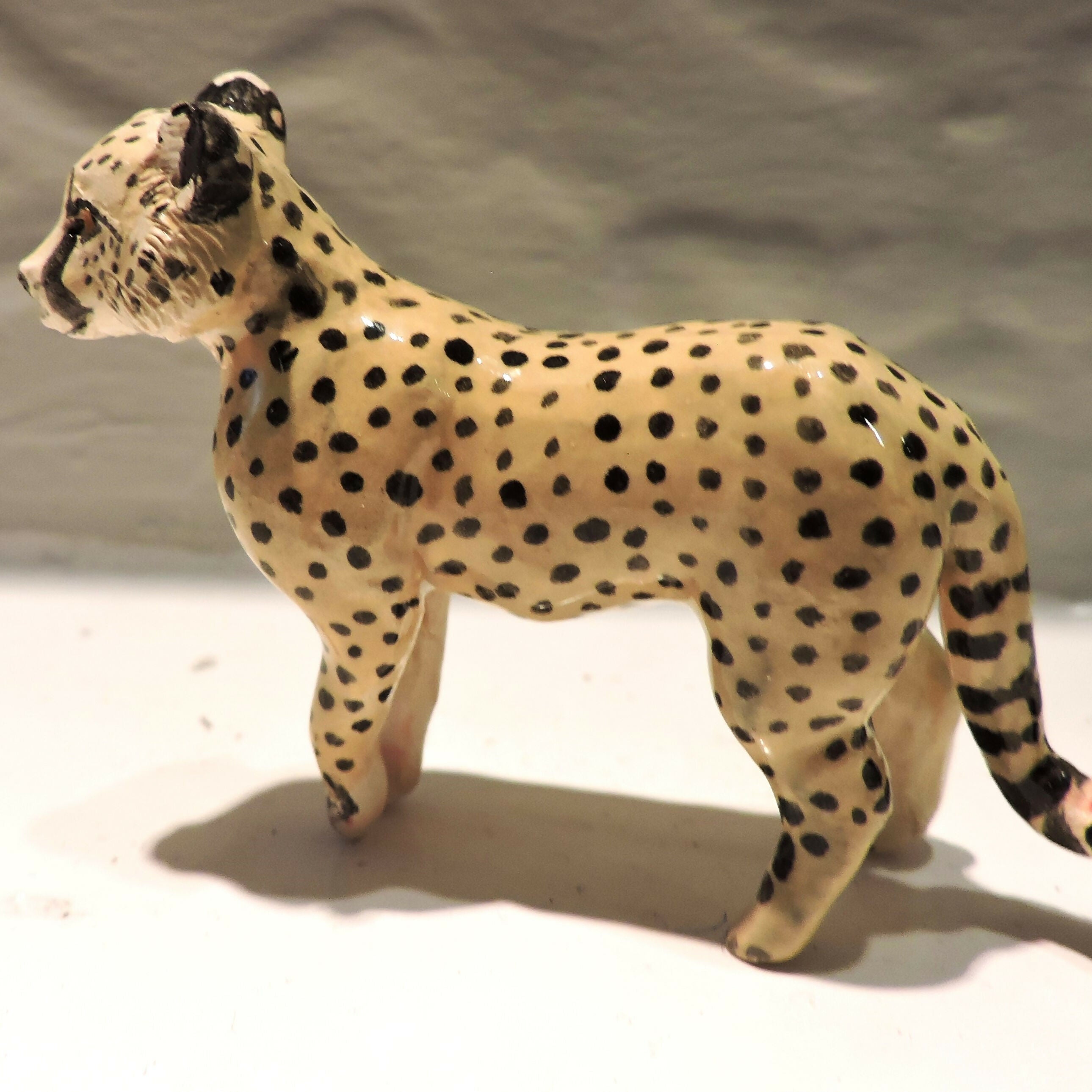 Ceramic cheetah sculpture
