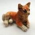 Ceramic ginger cat sculpture