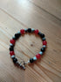 Tibetan Silver Toggle Catch Bracelet with Faceted Onyx, Siltstone and Red Chalcedony.