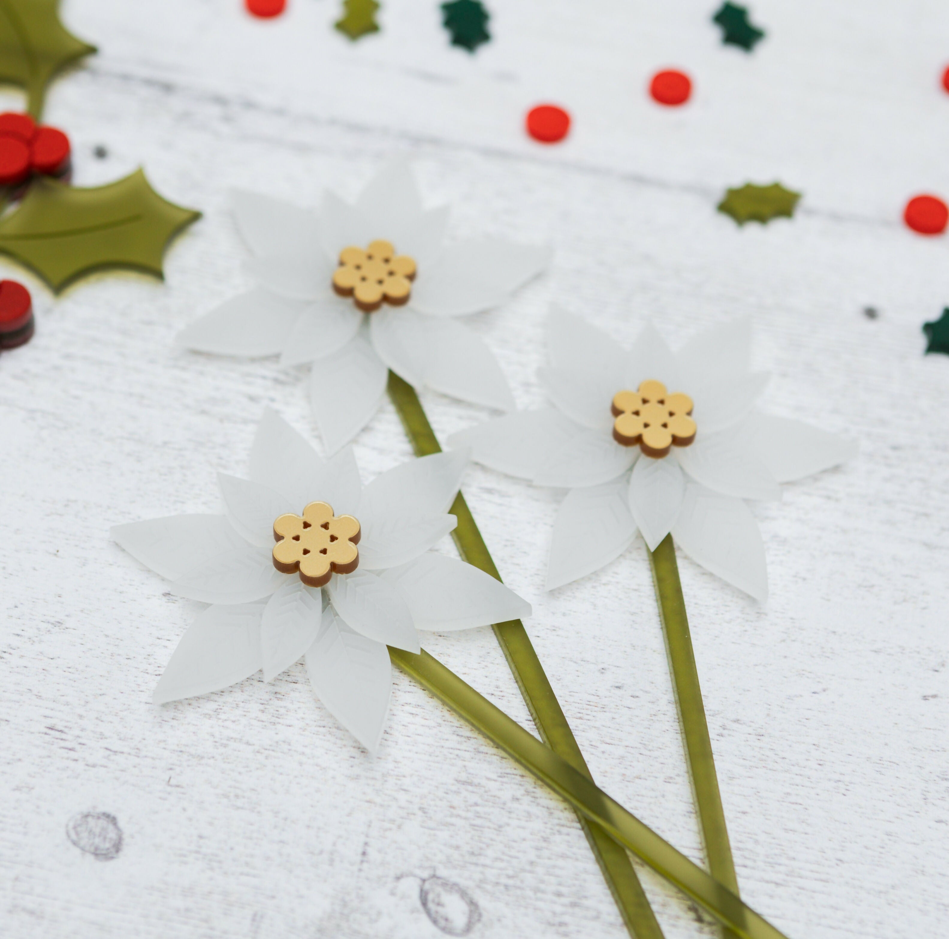 White Poinsettia and Holly Vase