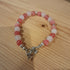 Tibetan Silver toggle Catch Bracelet with Strawberry Quartz, Rose Quartz and Tibetan Silver Spacer Beads.