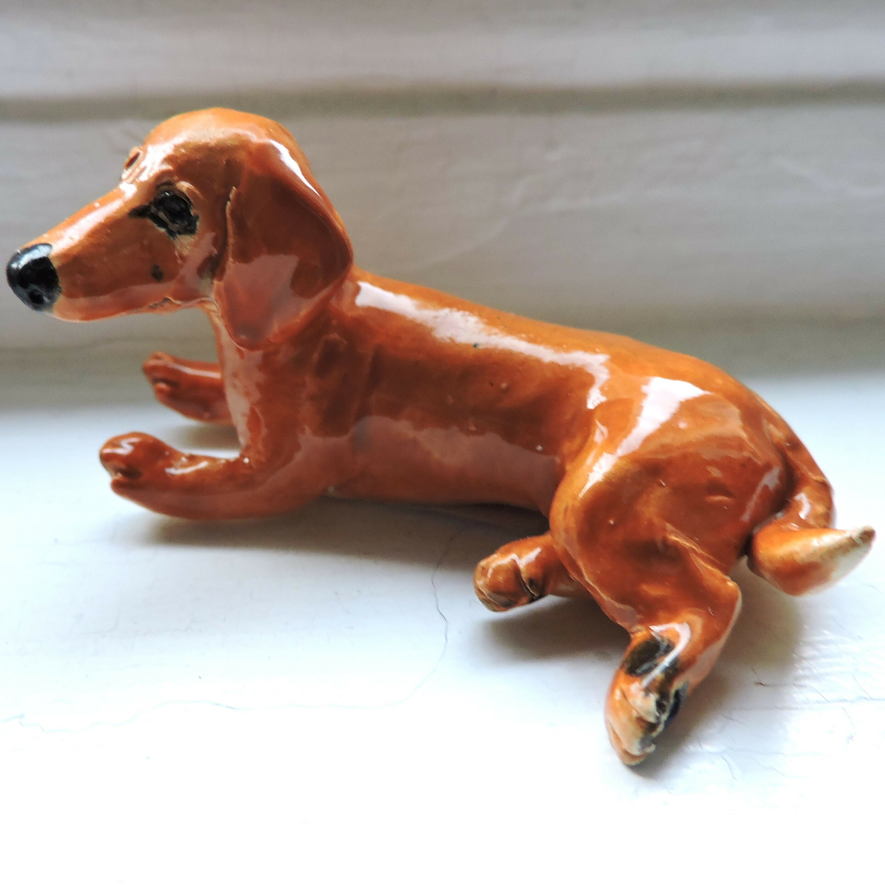 Ceramic red Dachshund dog sculpture