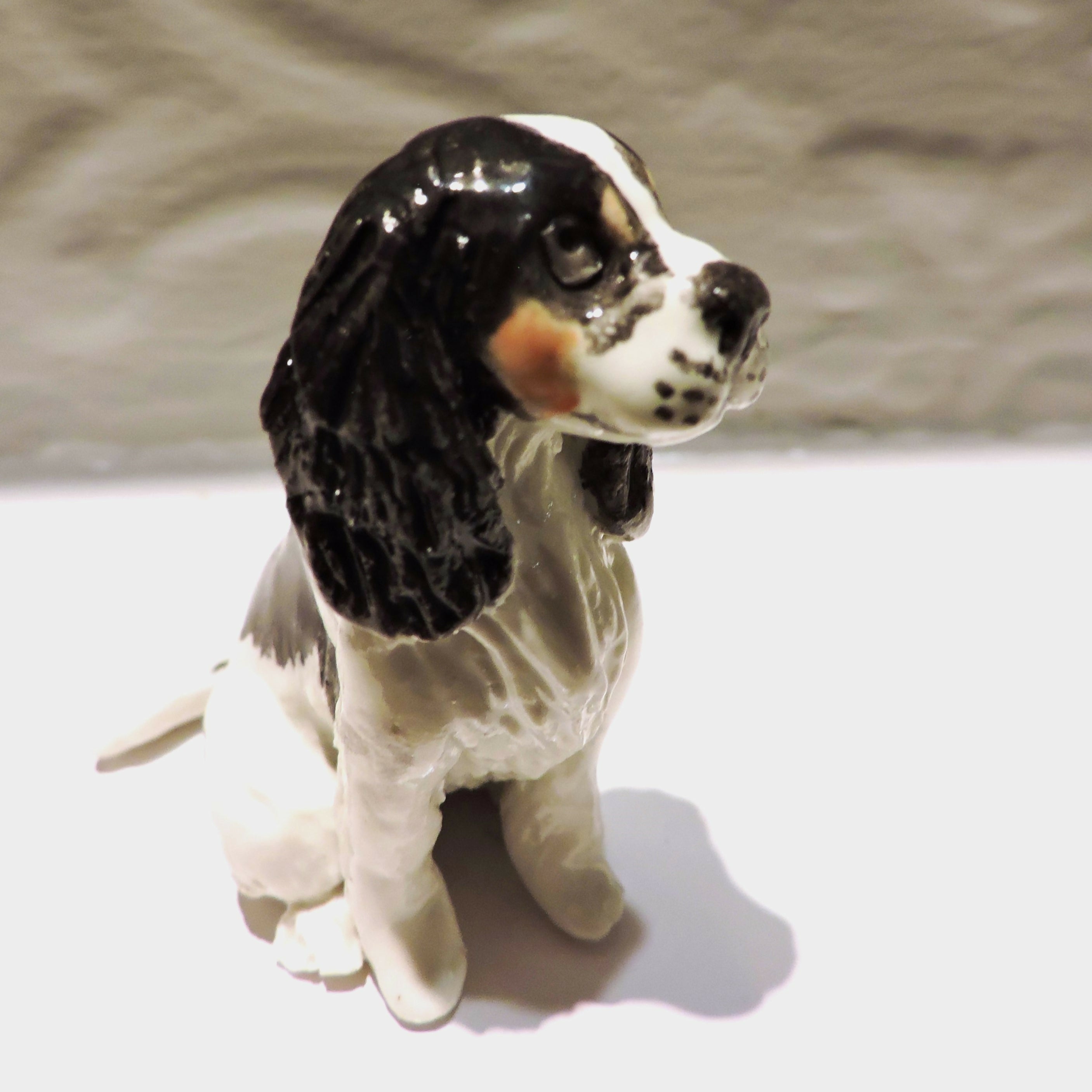 Ceramic cavalier king charles spaniel dog sculpture, tricolour