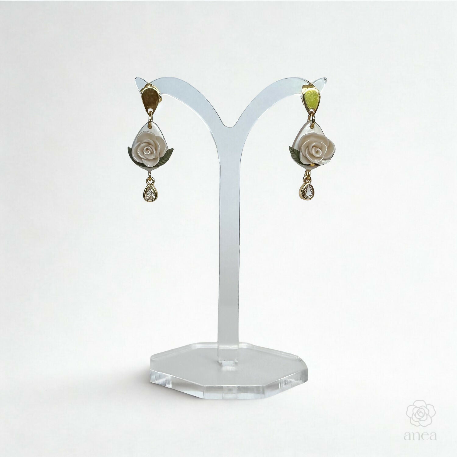 White Rose Drop Earrings with Green Leaf and Crystal Teardrop Detail