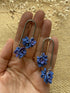 Long Arc Drop Earrings with Blue Flower Cluster