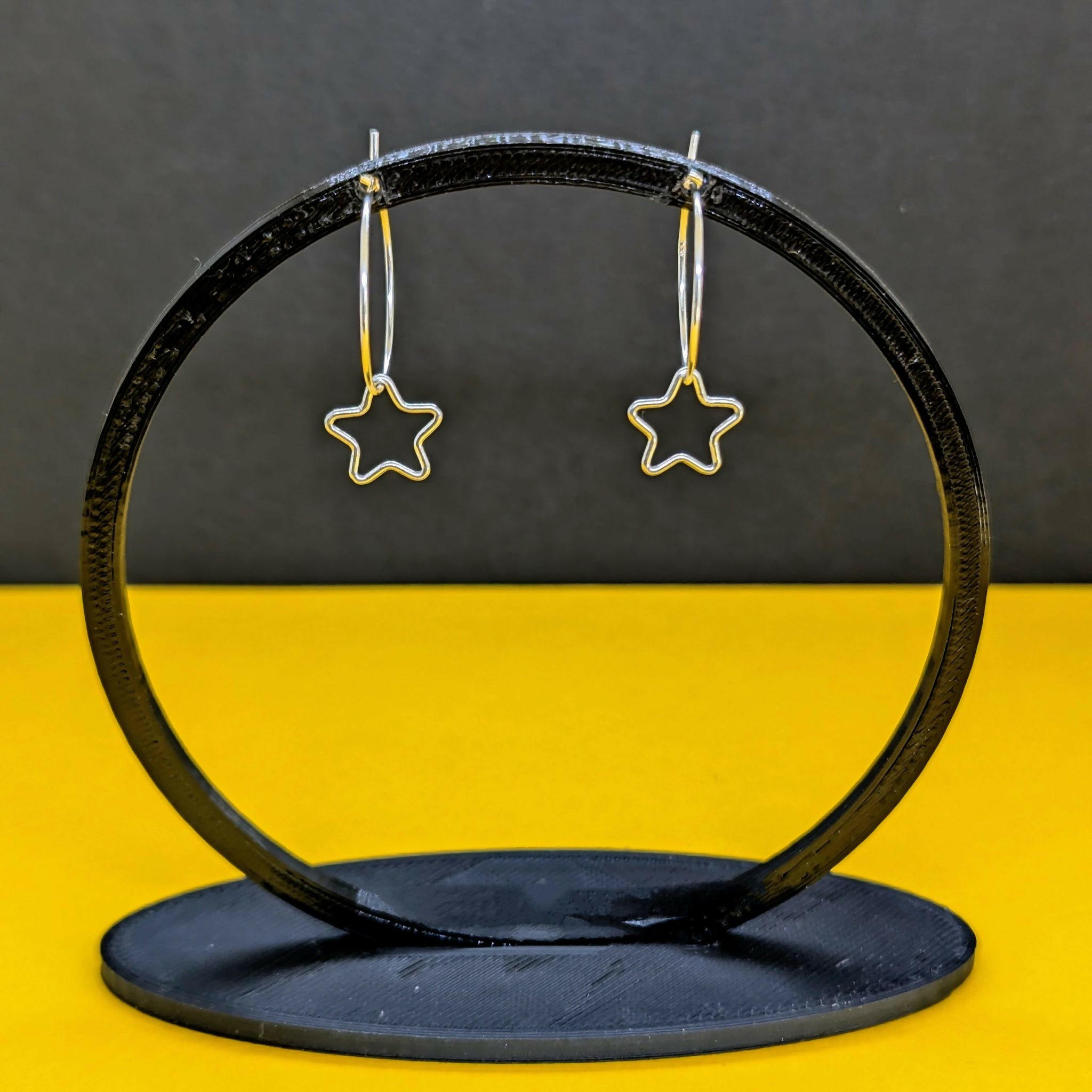 Starlight’ Sterling Silver Small Star Hoop Earring
