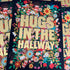 Hugs in the hallway A4 Foil Framed Print