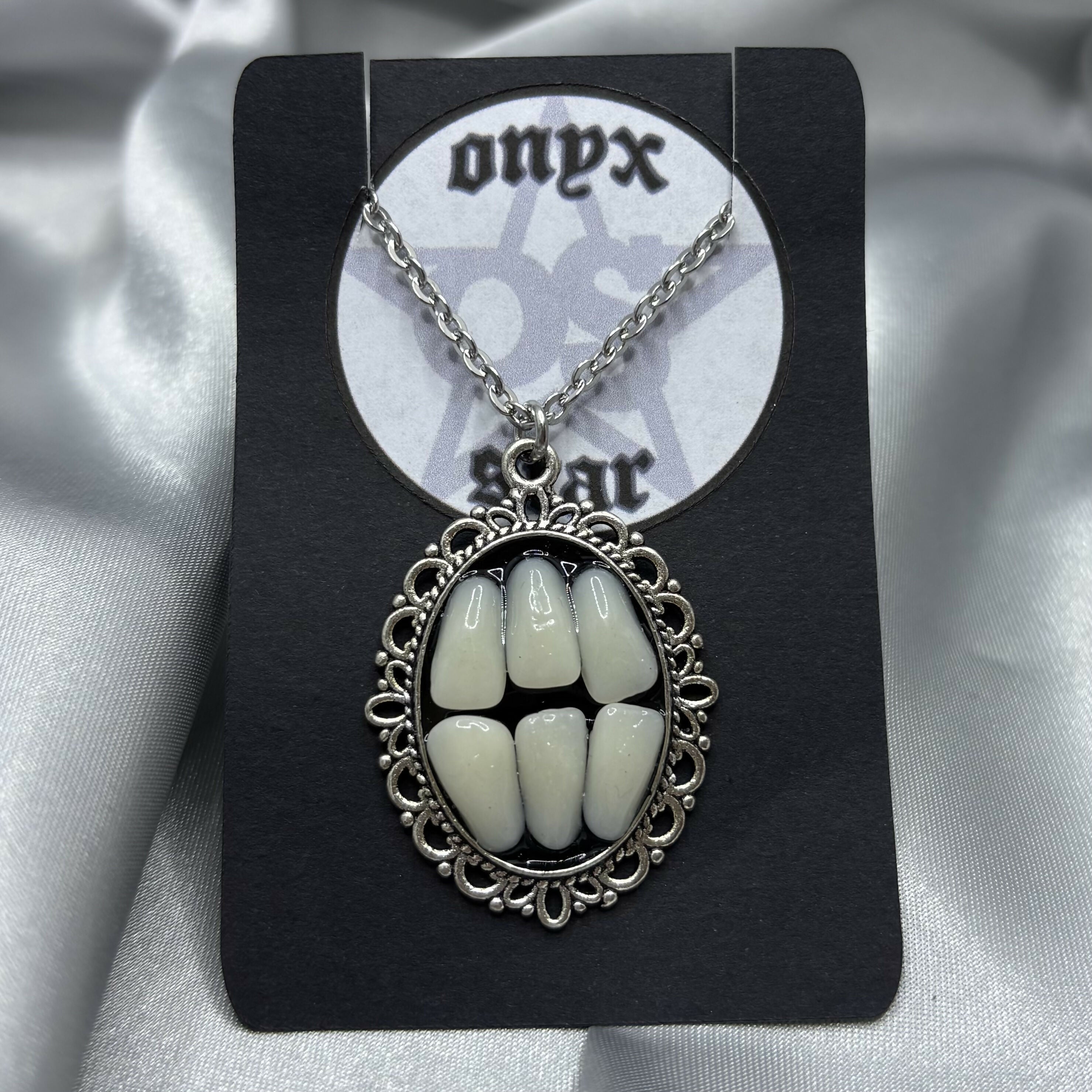 Grinding Teeth Necklace