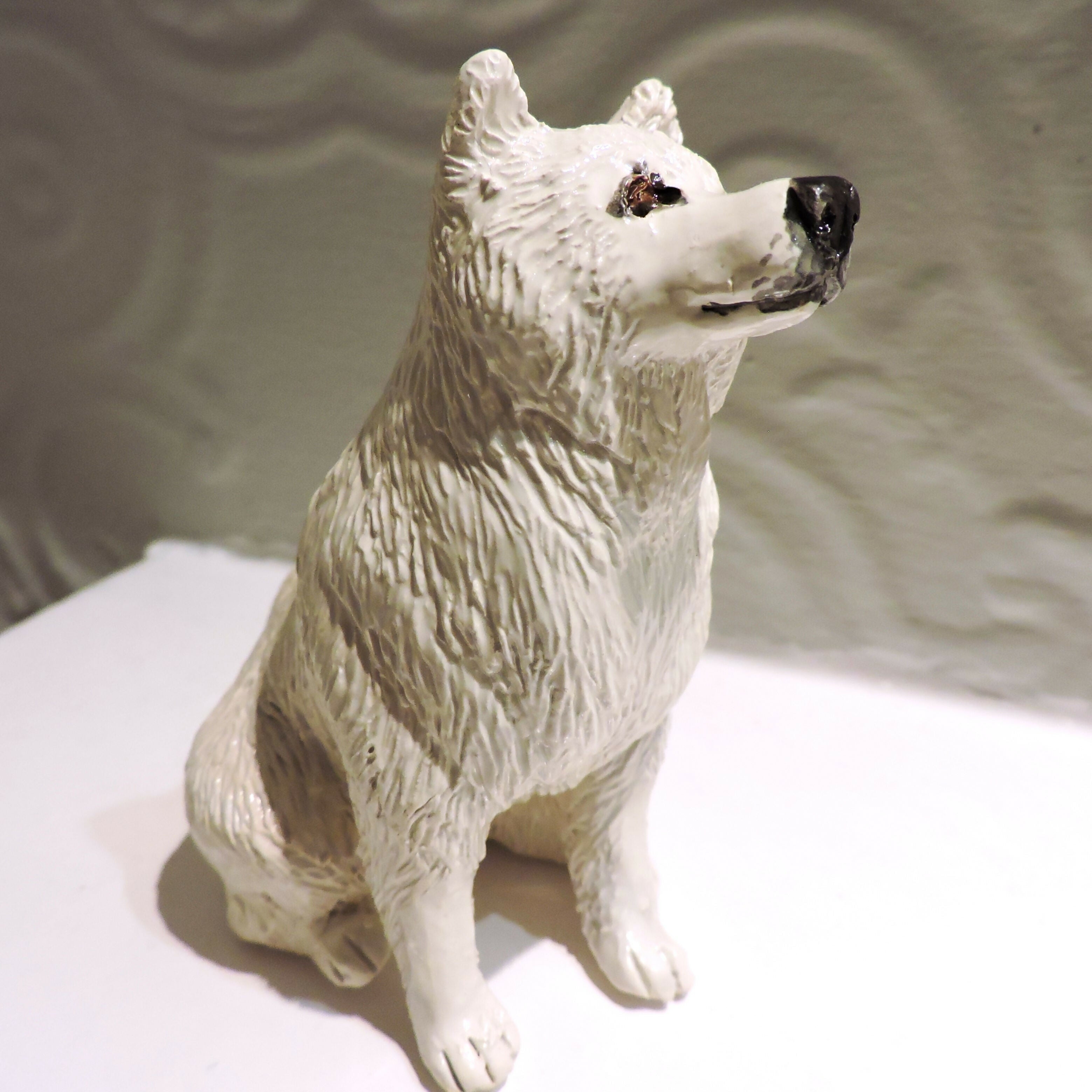 Ceramic Samoyed dog sculpture