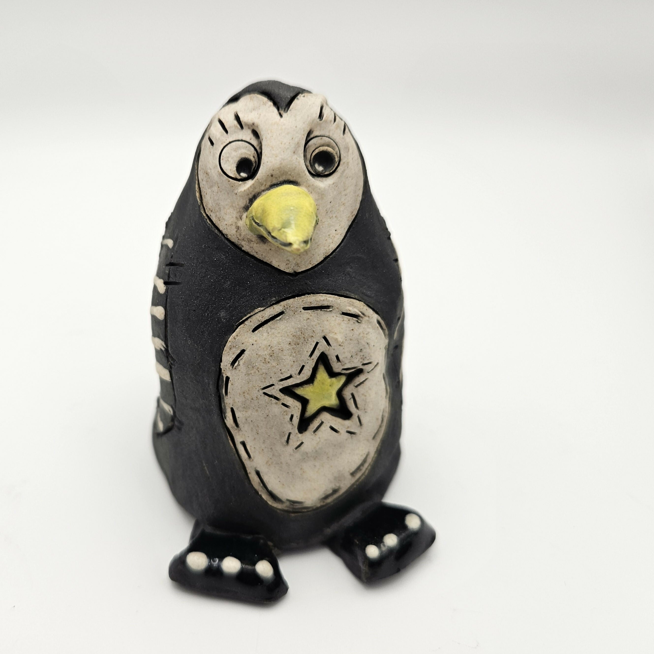 CHARMING CERAMIC PENGUIN.