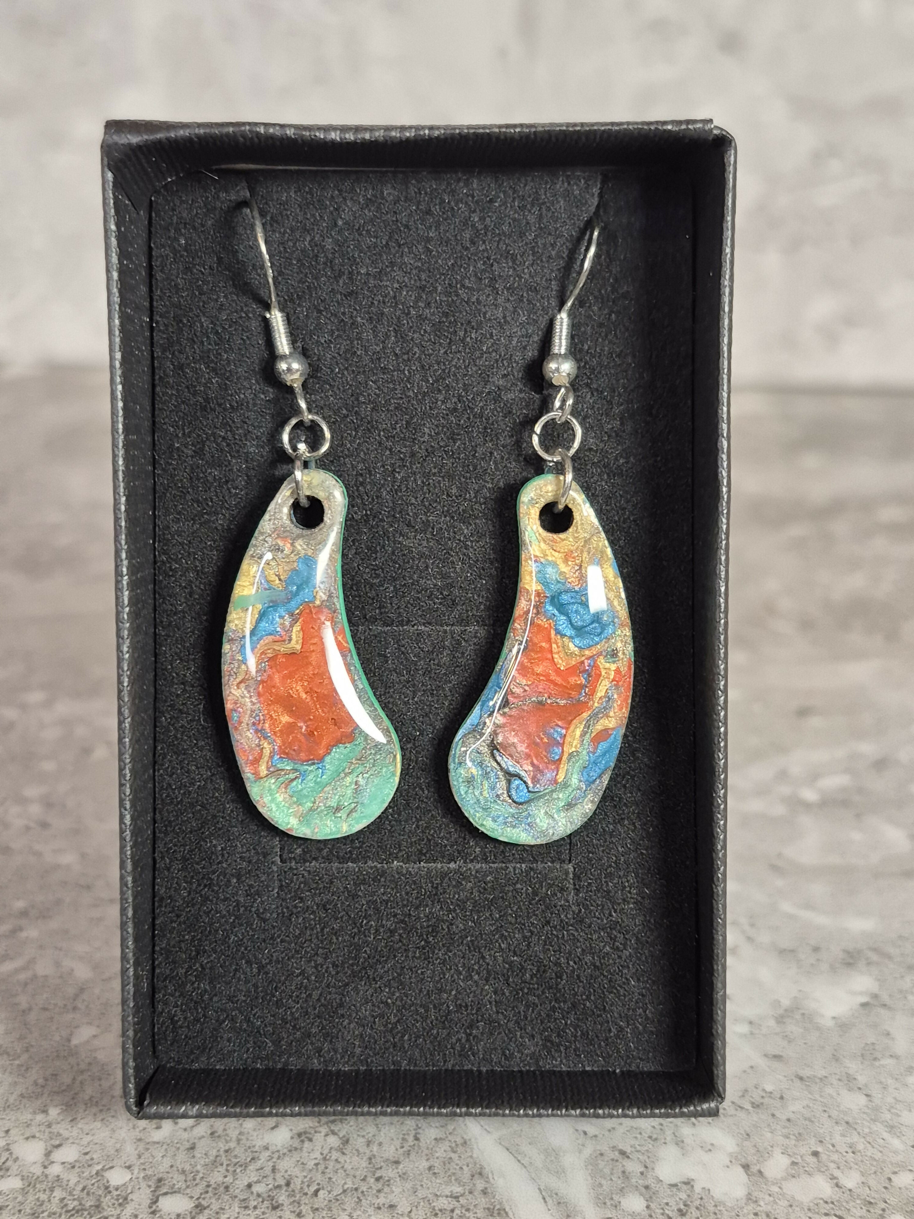 Handcrafted teardrop shaped multicoloured earrings.