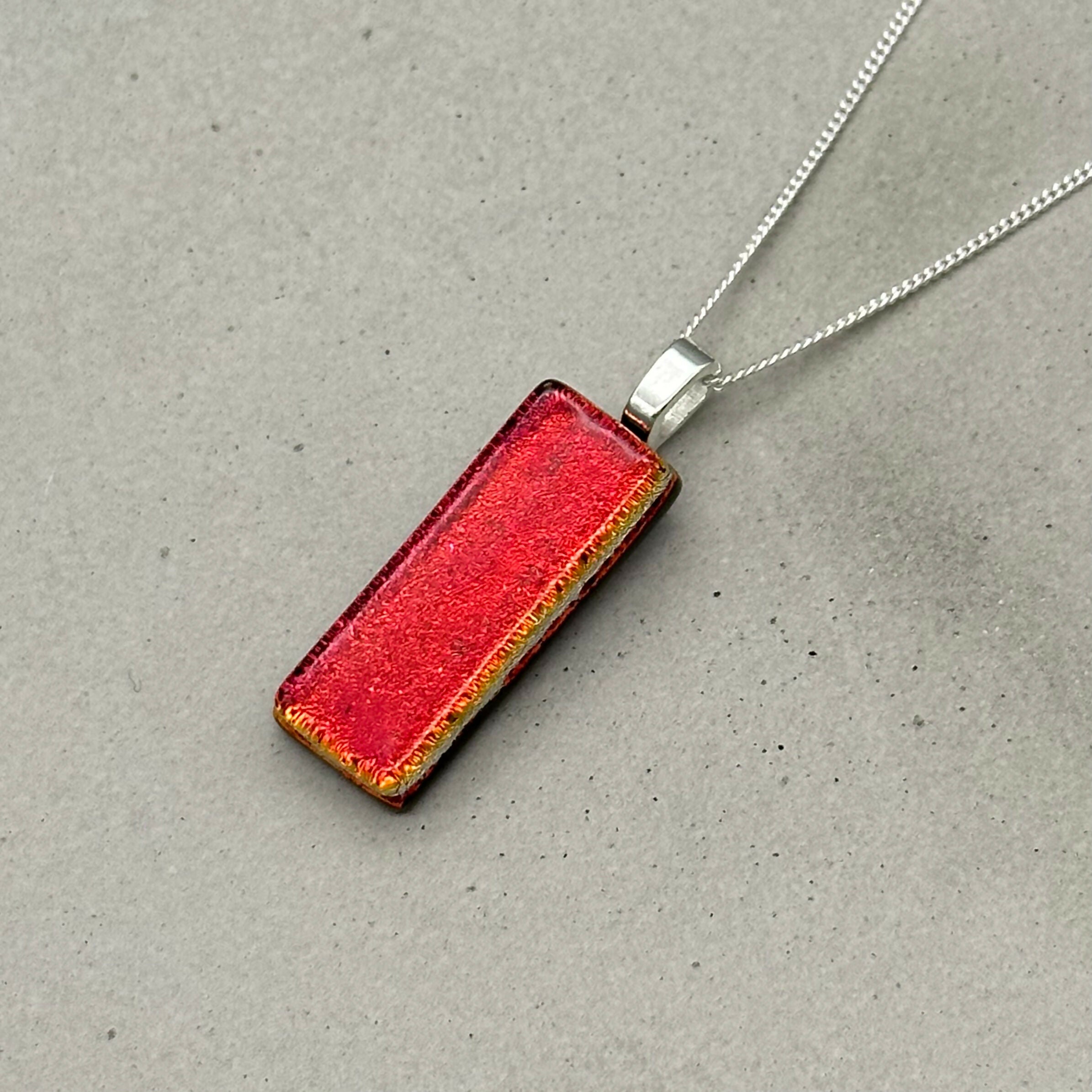 Red Dichroic Fused Glass Pendant with Silver Plated Chain - Handmade by Jade Tapson Glass.