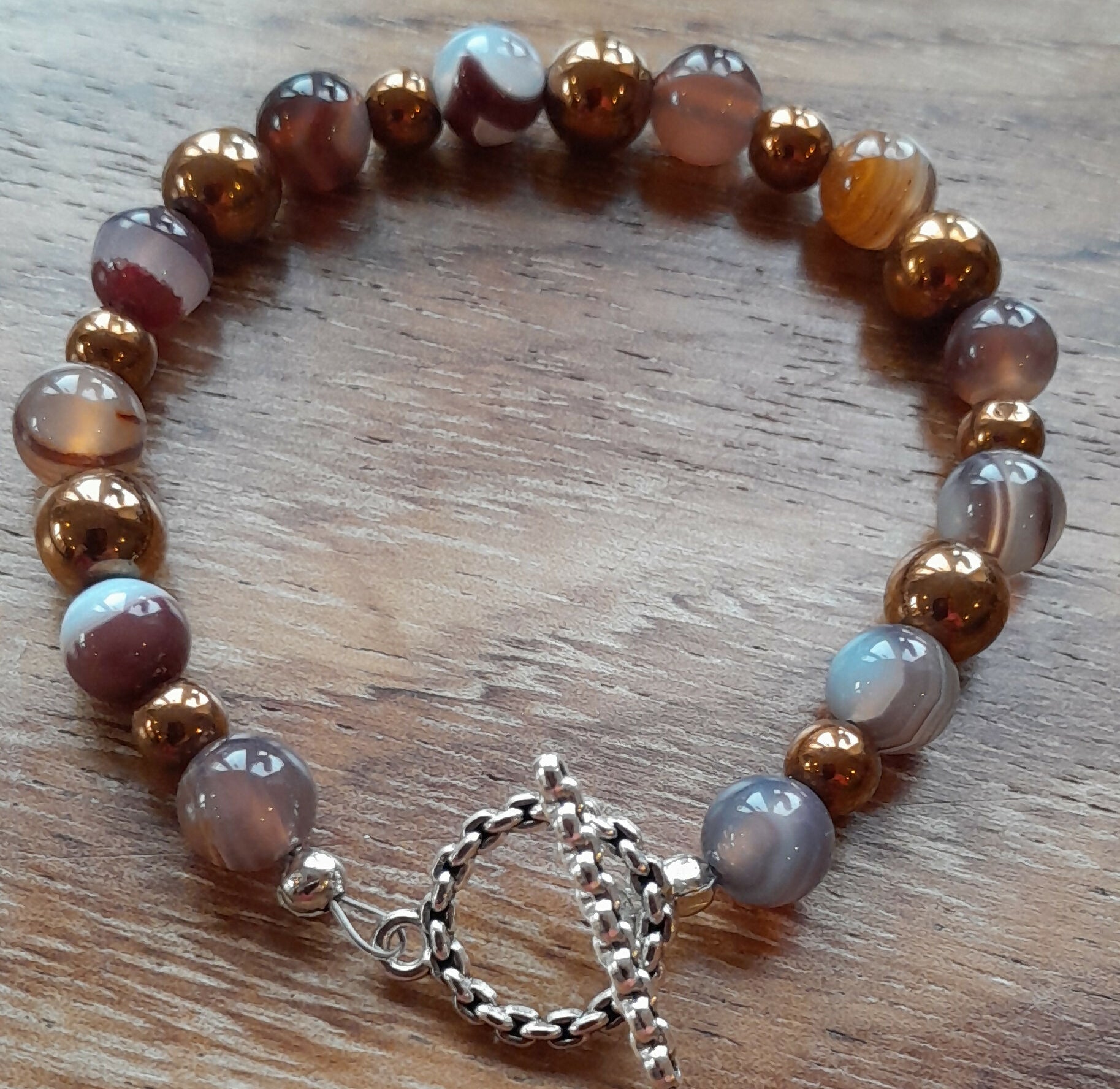 Gemstone Bracelet with Tibetan Silver Toggle Catch with Banded Persian Agates and Copper Hematite.