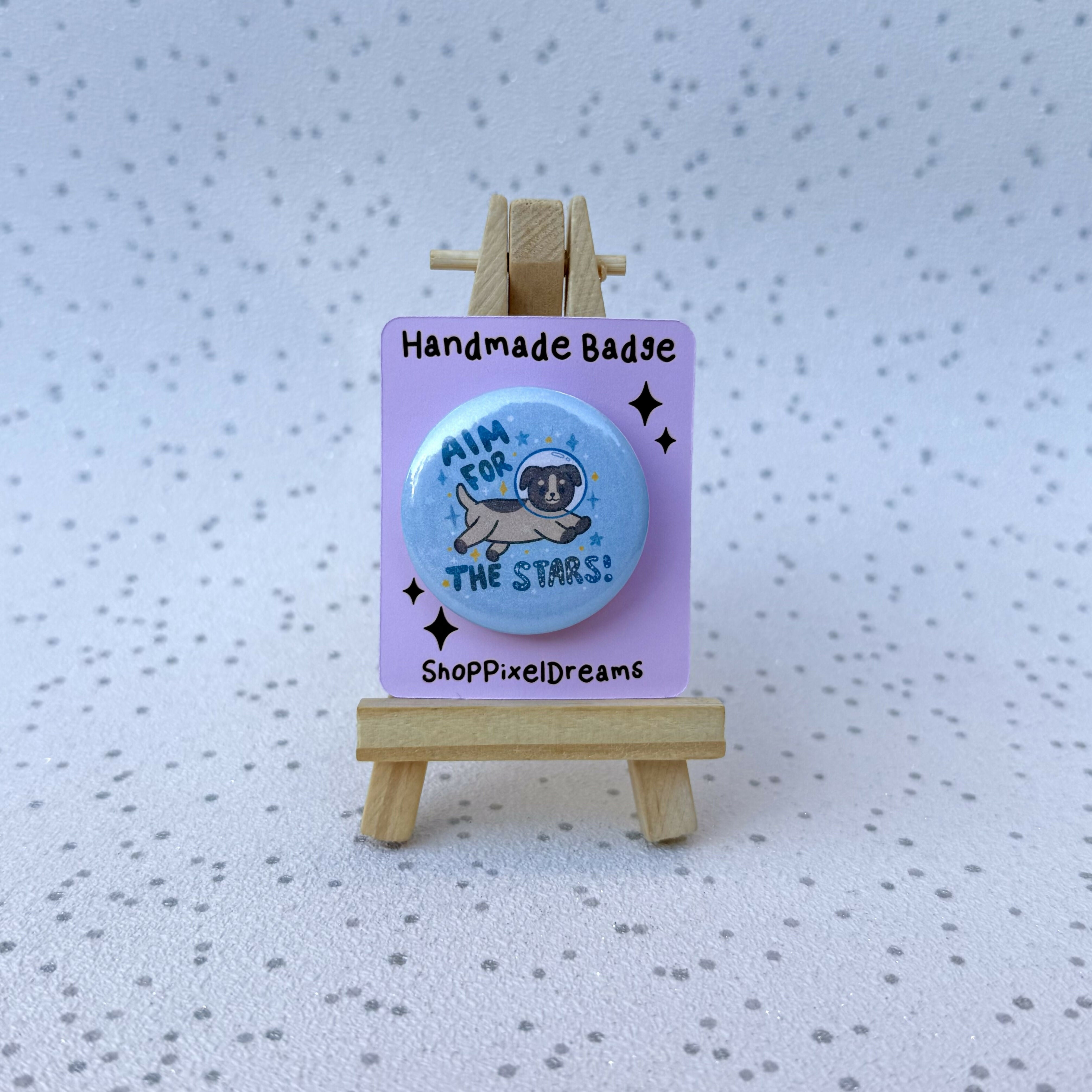 Aim For The Stars Space Dog Motivational Holographic Pin Badge