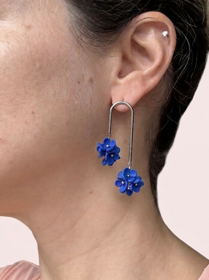 Long Arc Drop Earrings with Blue Flower Cluster
