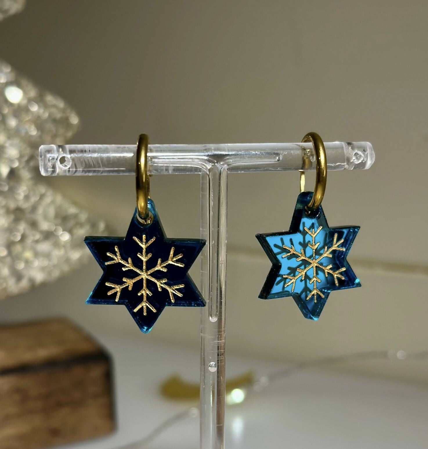 STAR HOOP WITH GOLD ENGRAVED SNOWFLAKE DESIGN