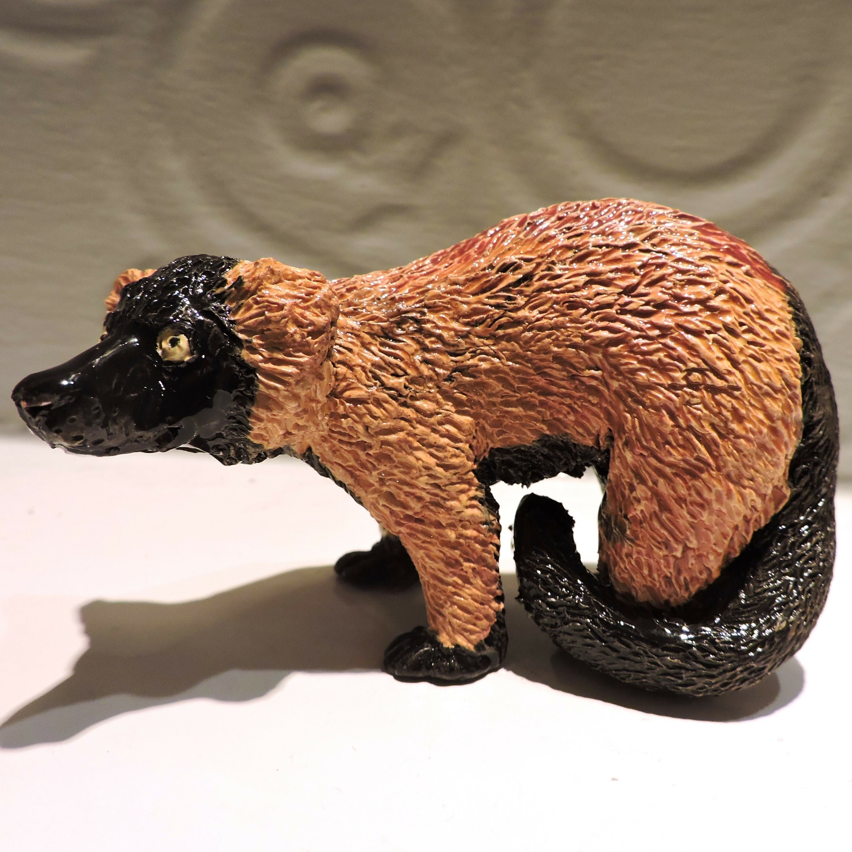 Ceramic standing Red ruffed lemur sculpture