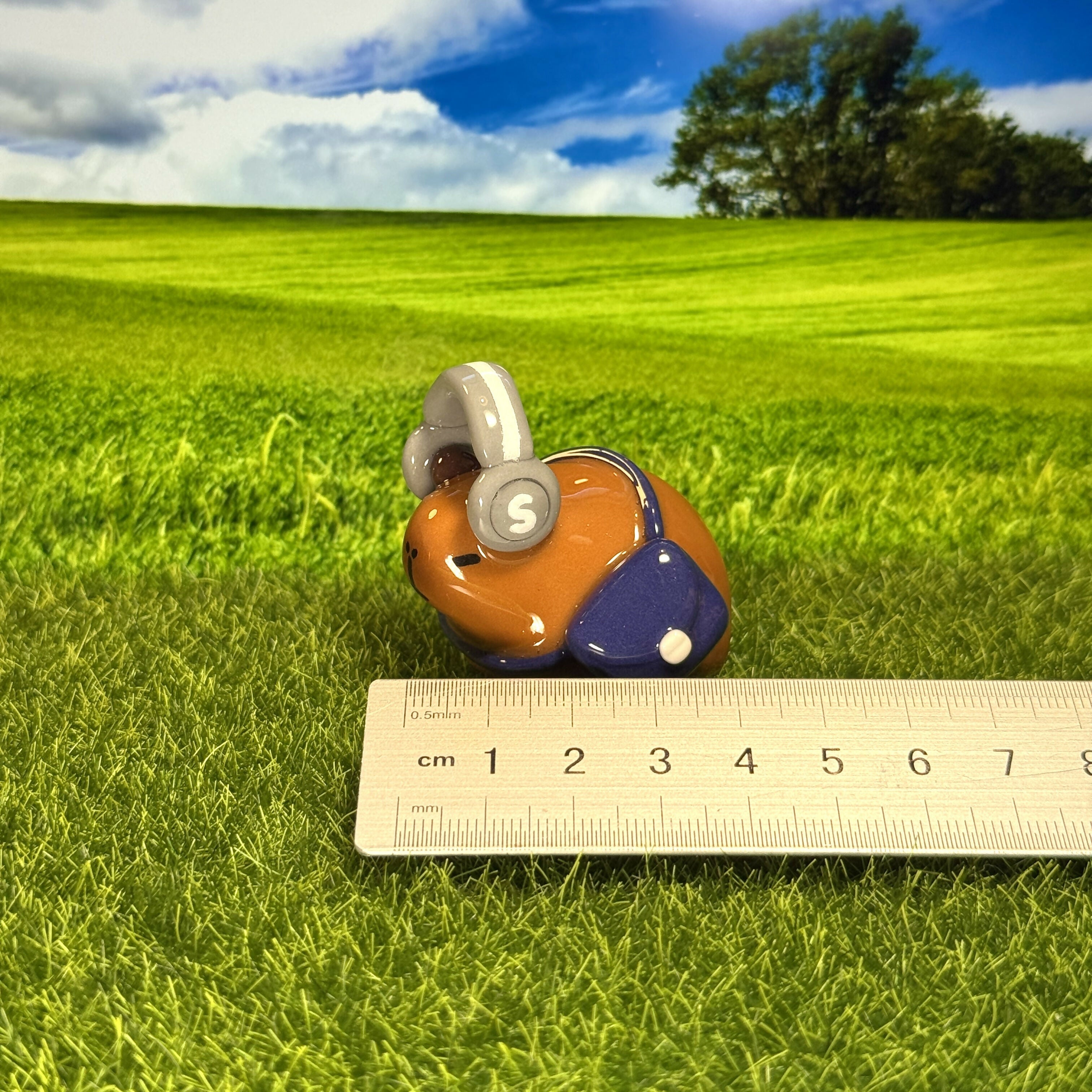 Cool Capybara With Headphone Figure