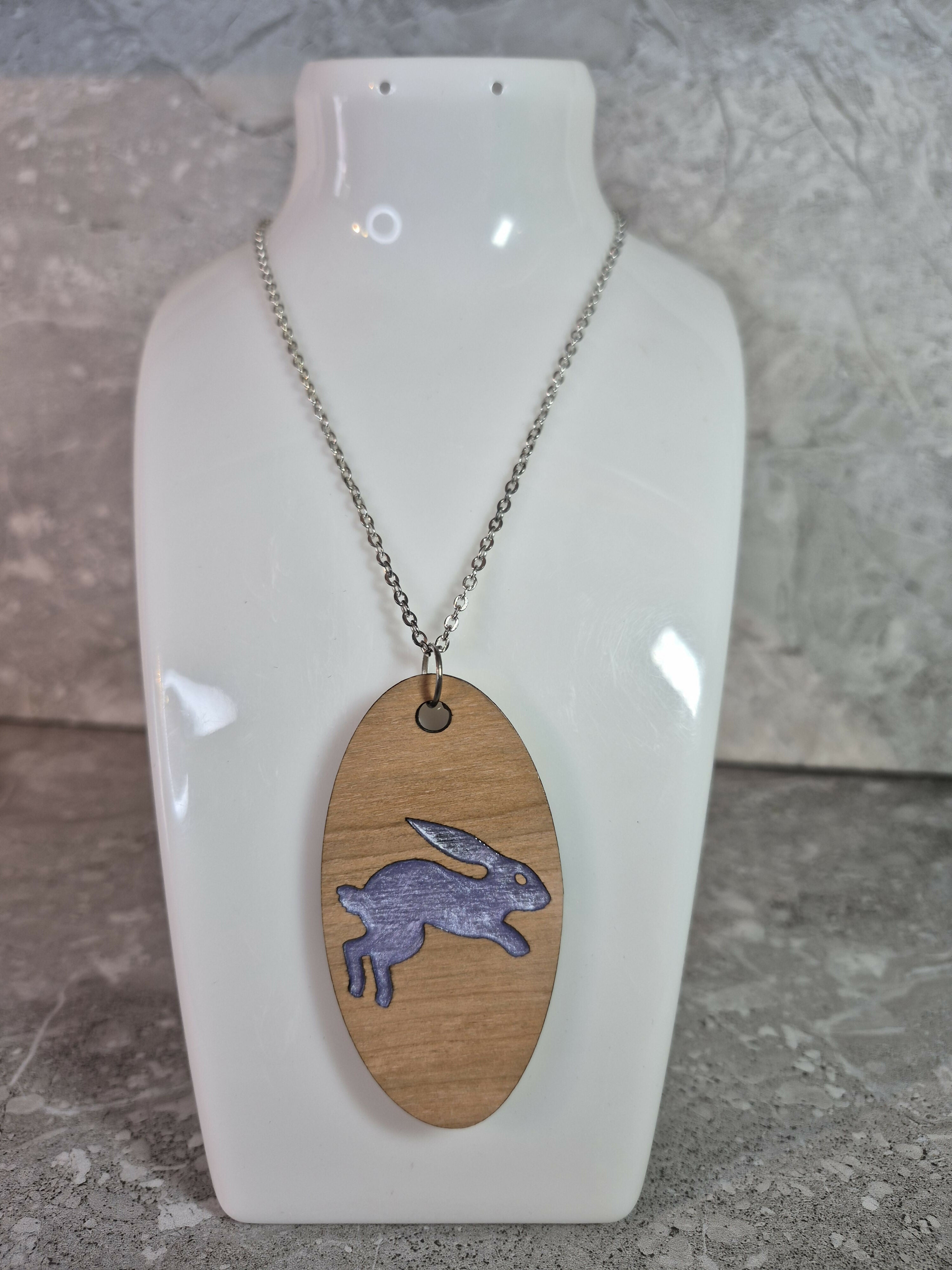 Unique Handcrafted Oval Pendant With An Engraved Leaping Hare
