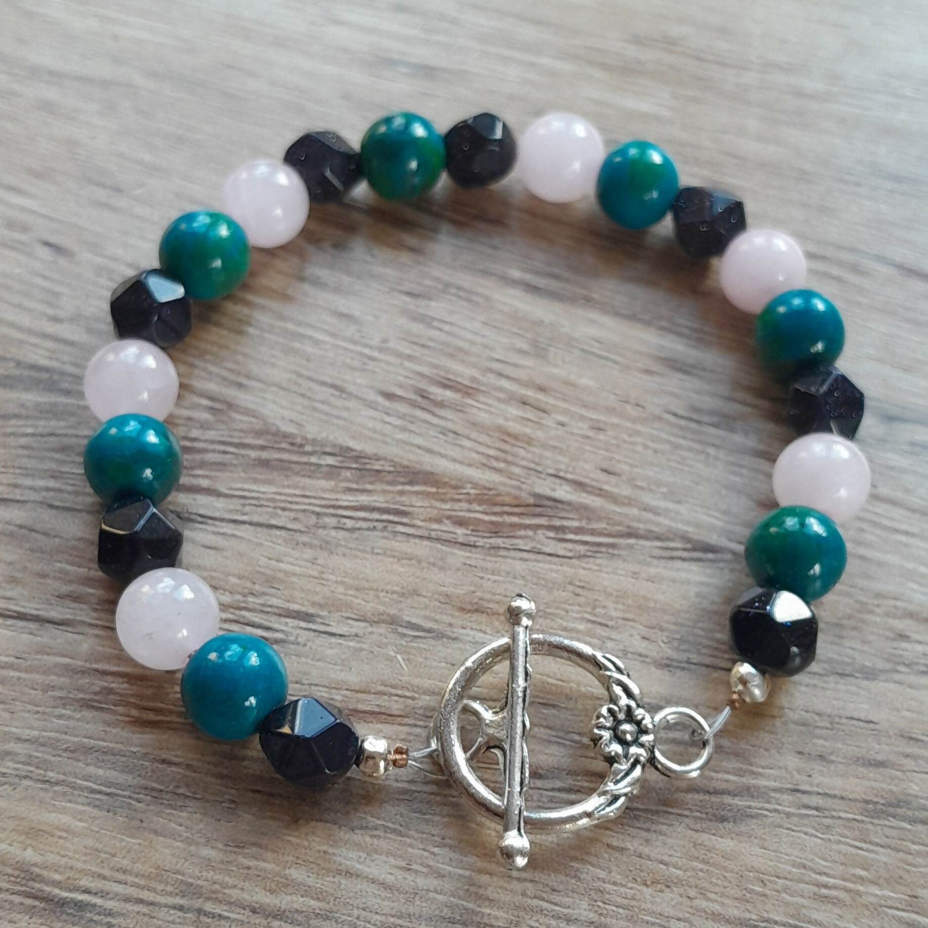 Tibetan Silver Toggle Catch Bracelet with Faceted Navy Goldstone, Chrysocolla and Rose Quartz.