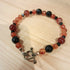 Bronze Toggle Catch Bracelet with Faceted Carnelian and Faceted Onyx.
