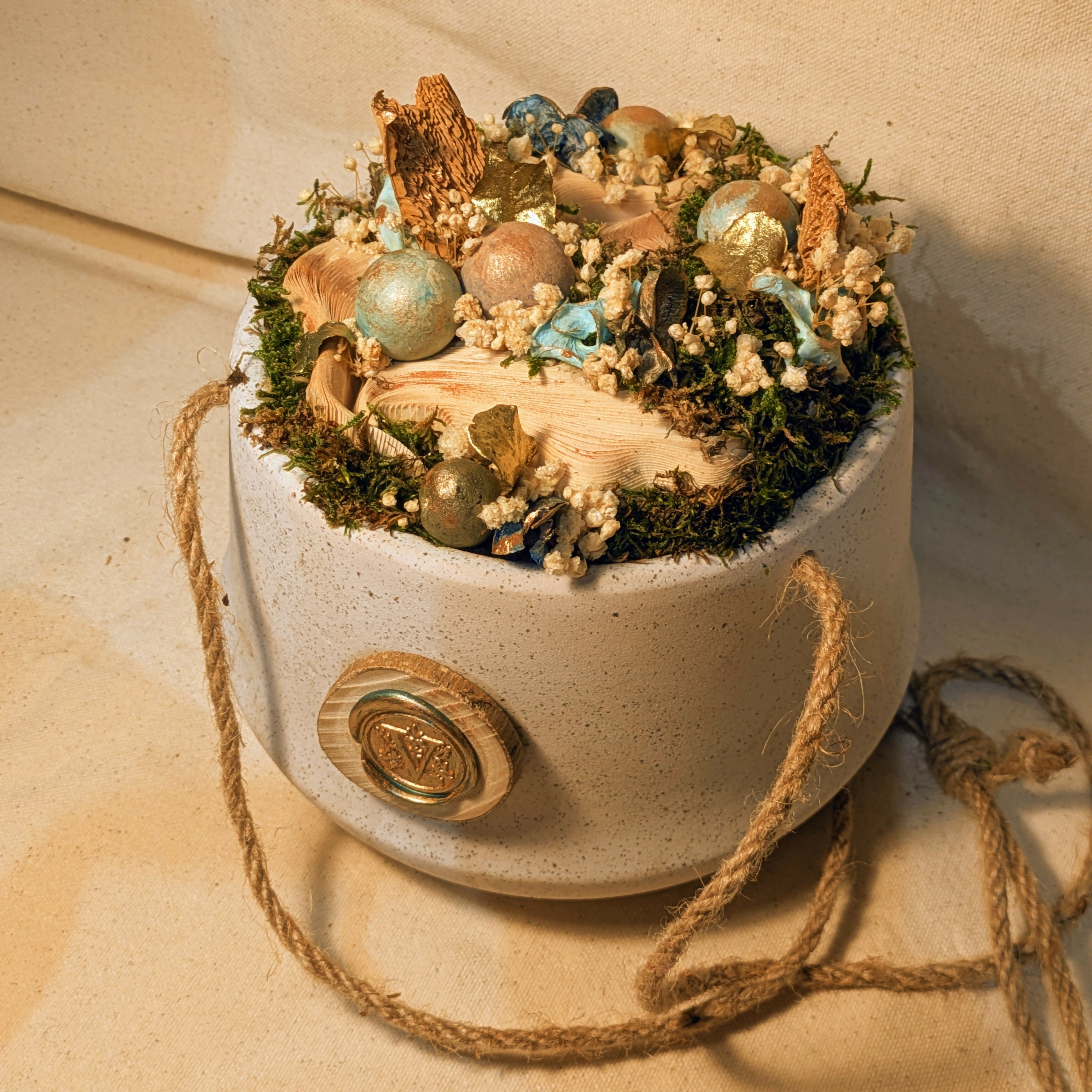 Floral Arrangement in Stone Hanging Pot