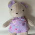 Teddy in a lilac flower dress