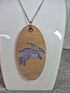 Unique Handcrafted Oval Pendant With An Engraved Leaping Hare