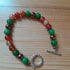 Tibetan Silver Toggle Bracelet with Pea Green Chalcedony, Copper Hematite and banded Orange Agate.