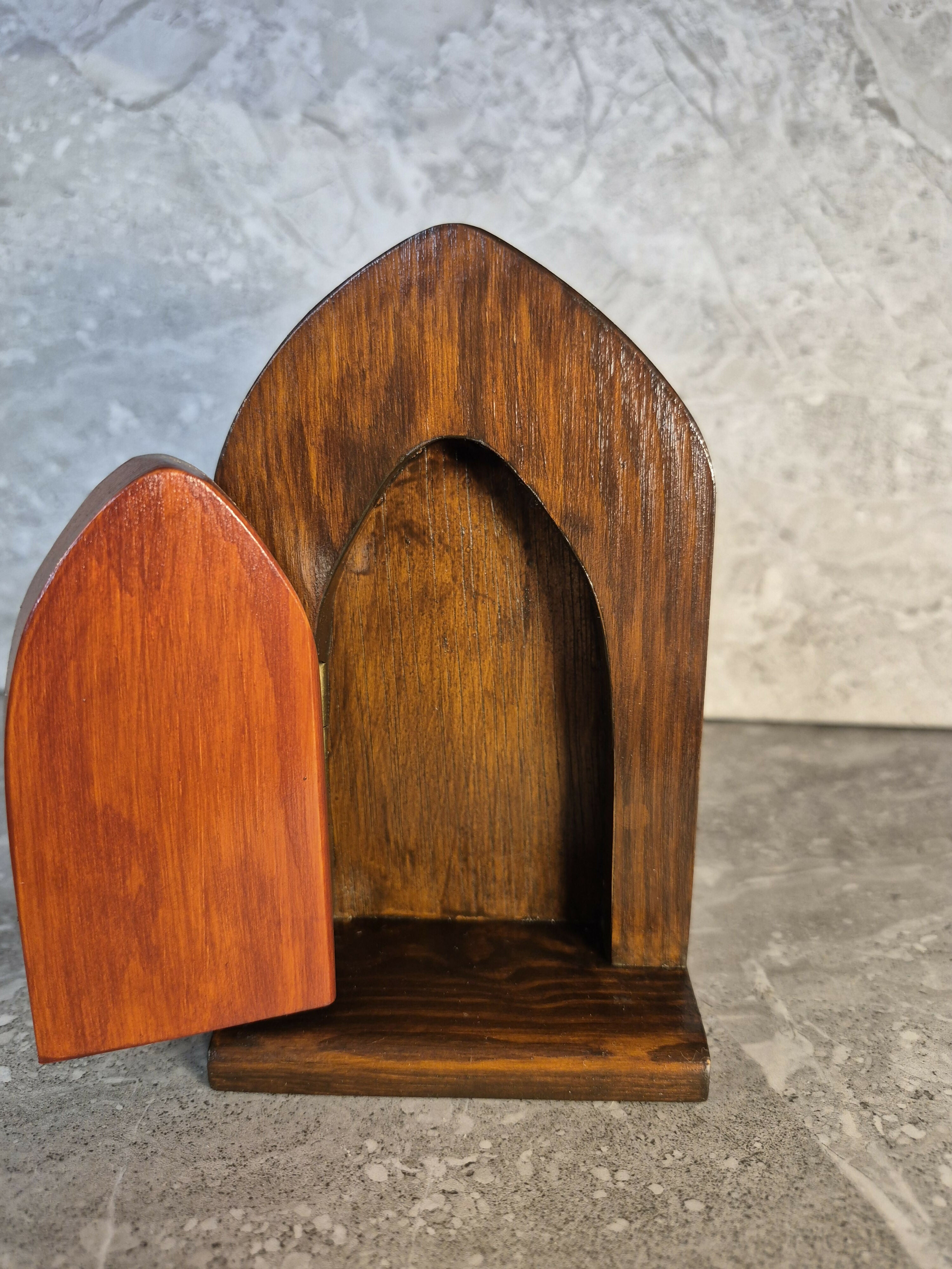 Handcrafted arched wooden fairy door.