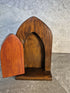 Handcrafted arched wooden fairy door.