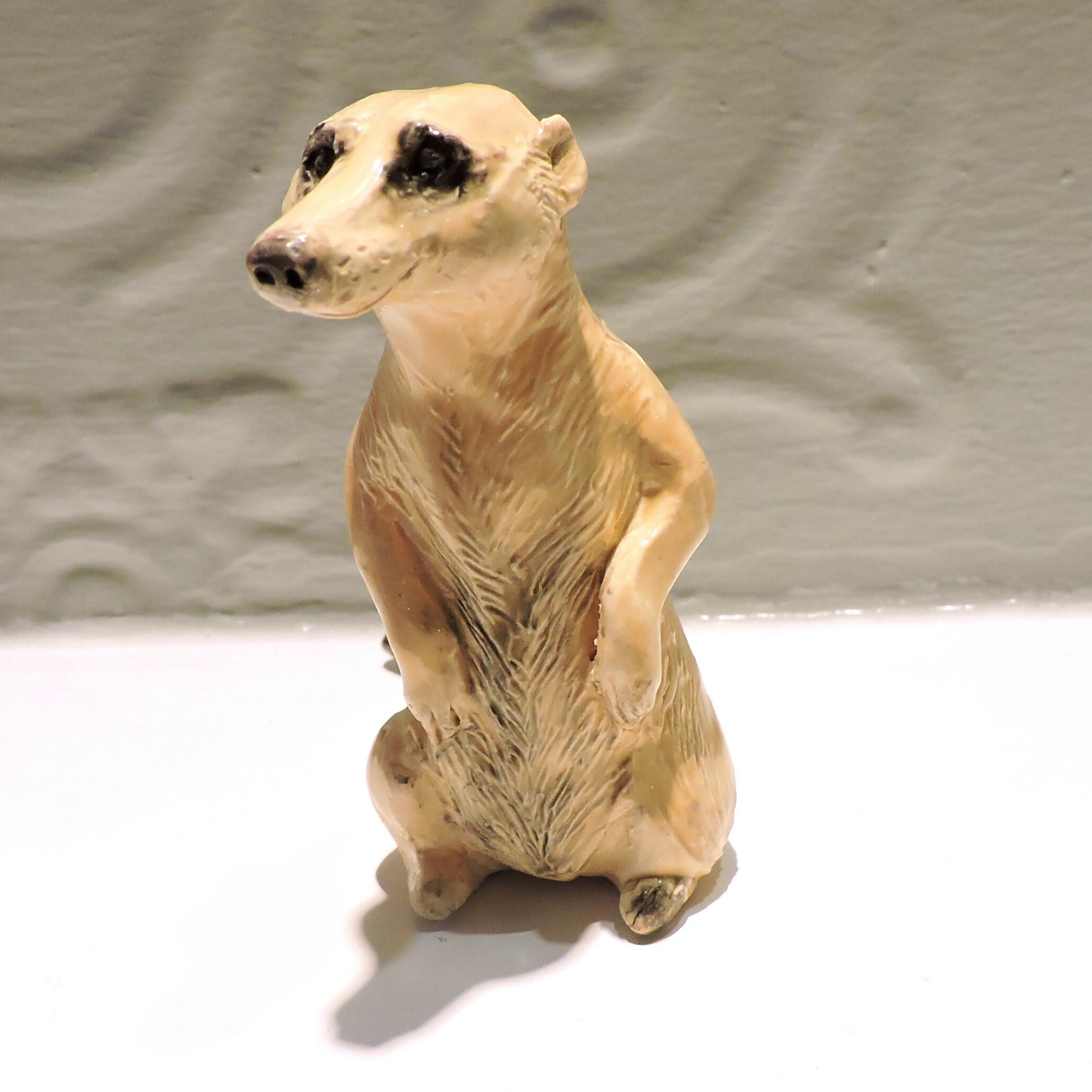 Ceramic Meerkat sculpture