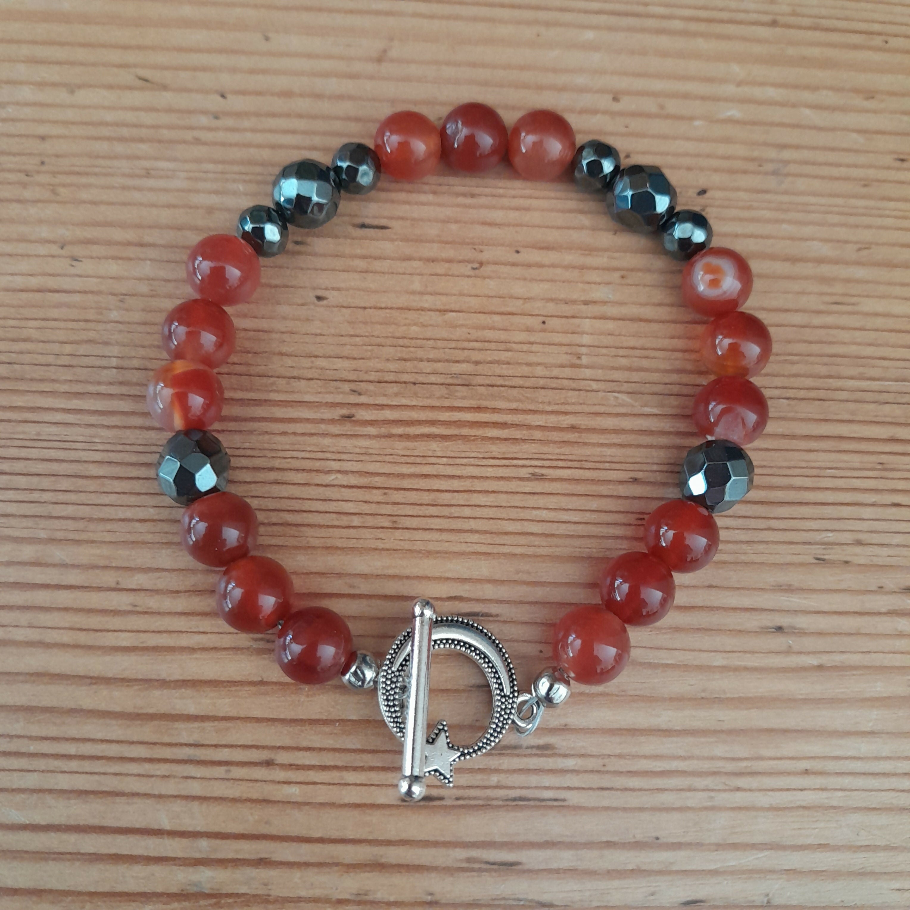Tibetan Silver Toggle Catch Bracelet with Carnelian and Faceted Grey Hematite.