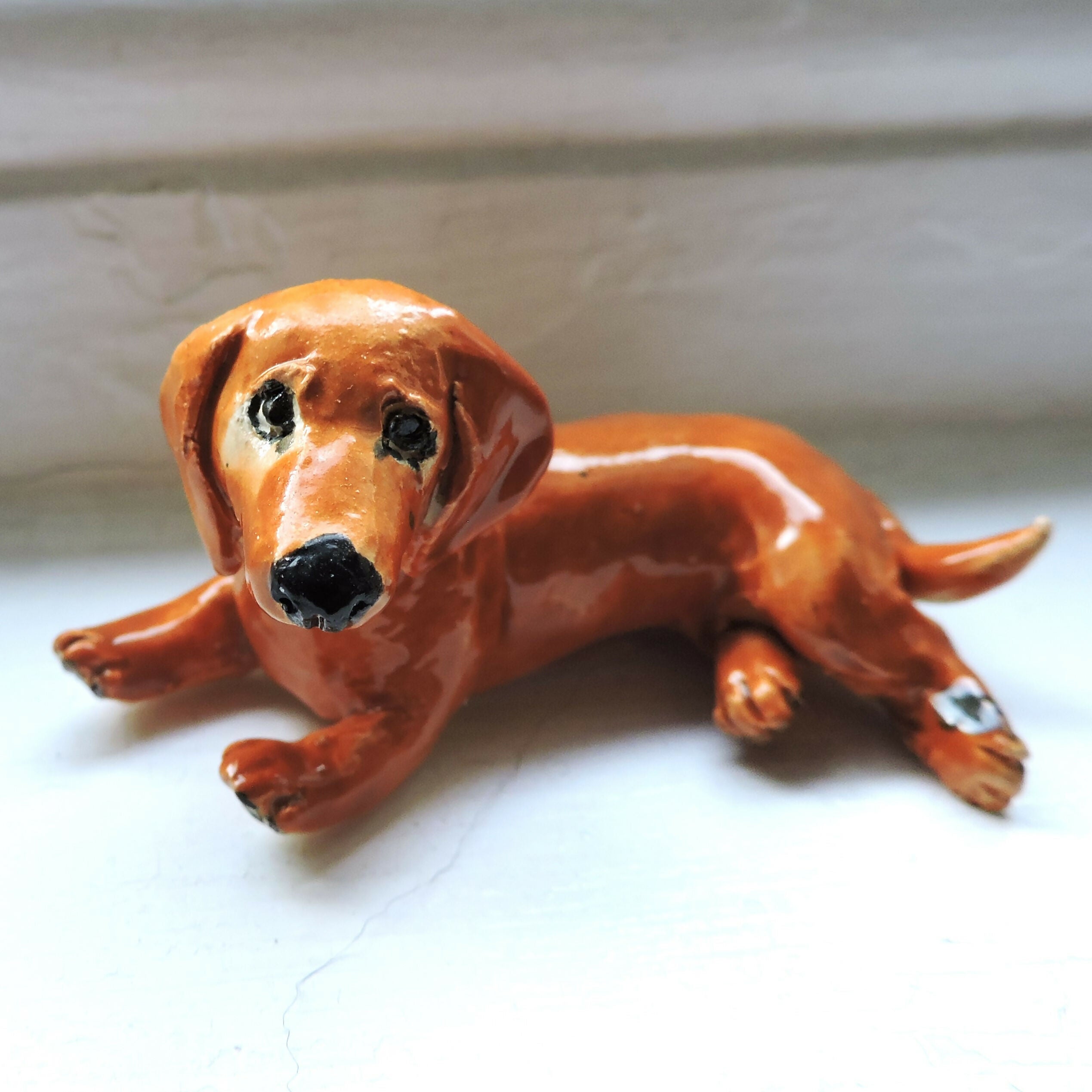 Ceramic red Dachshund dog sculpture