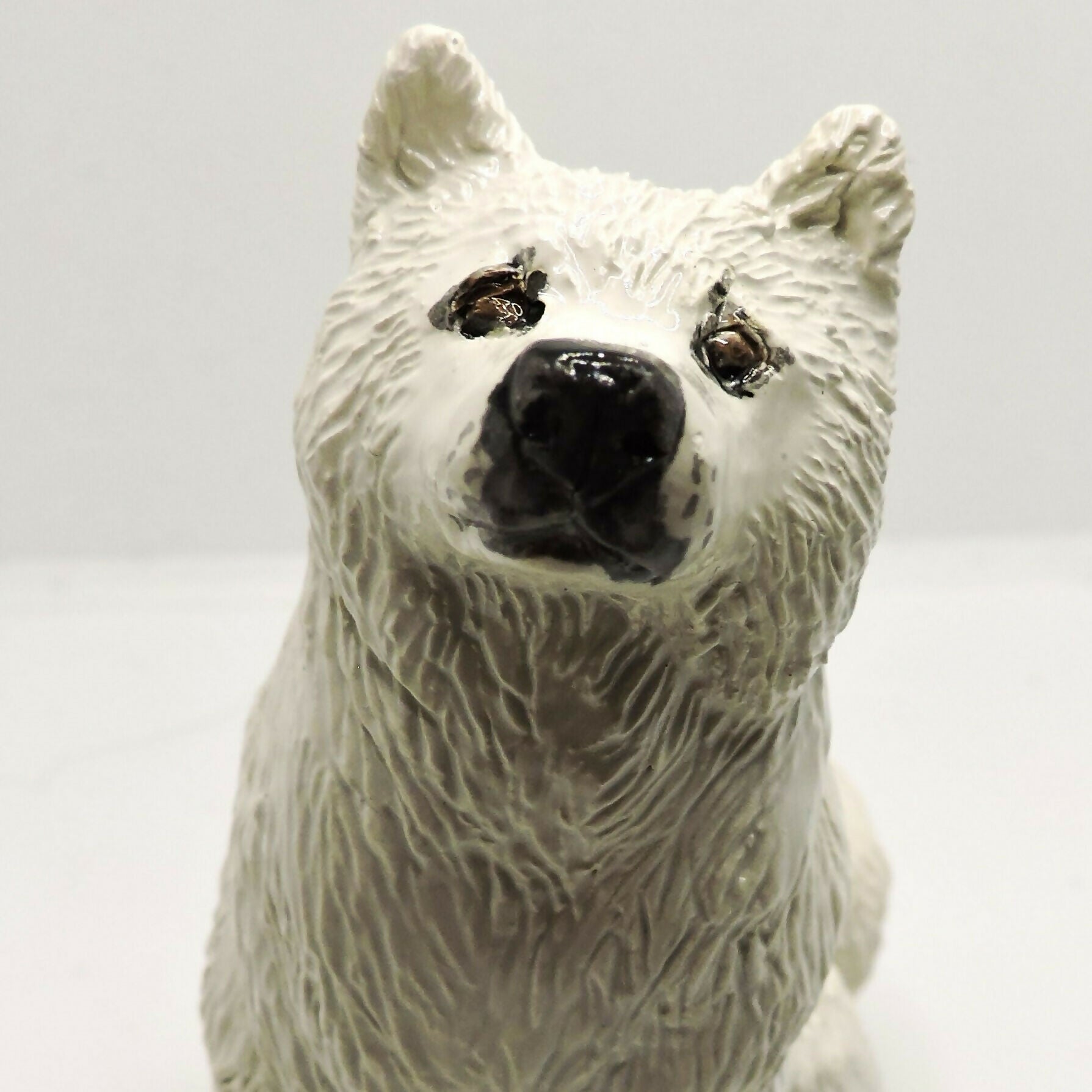 Ceramic Samoyed dog sculpture