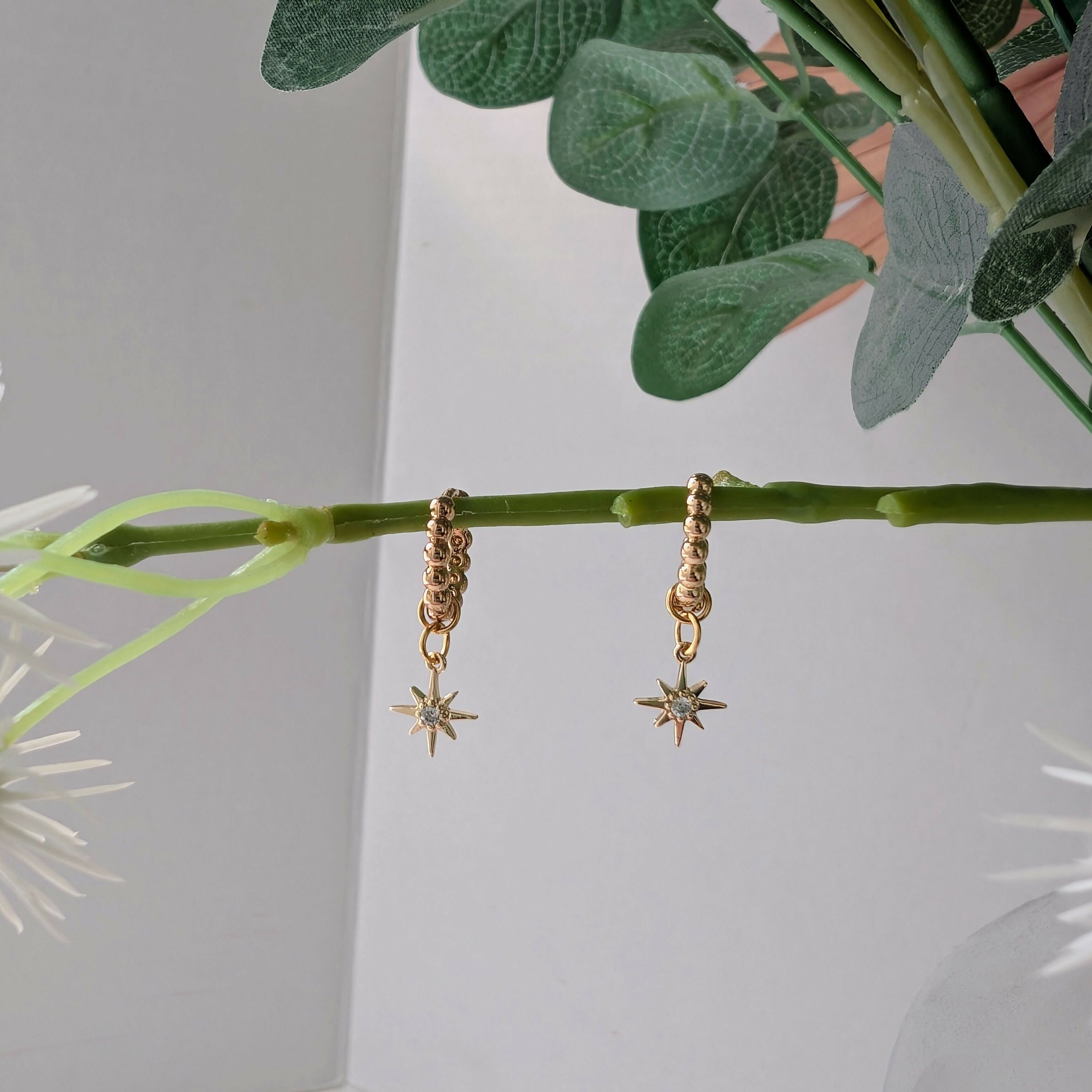 Gold Plated Bead Huggie Earrings with a Tiny Gold Cubic Zirconia Star Charm