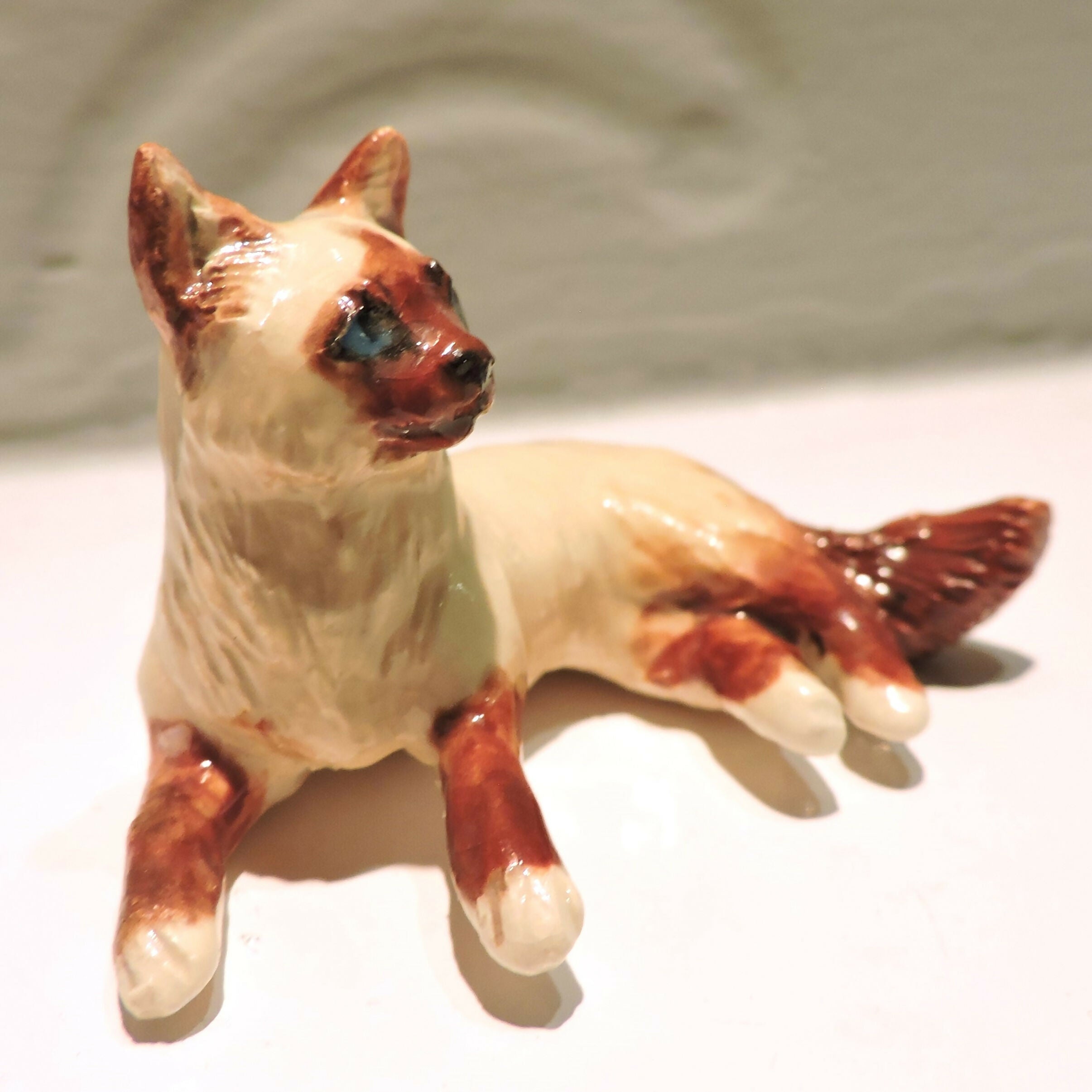 Ceramic Birman cat sculpture