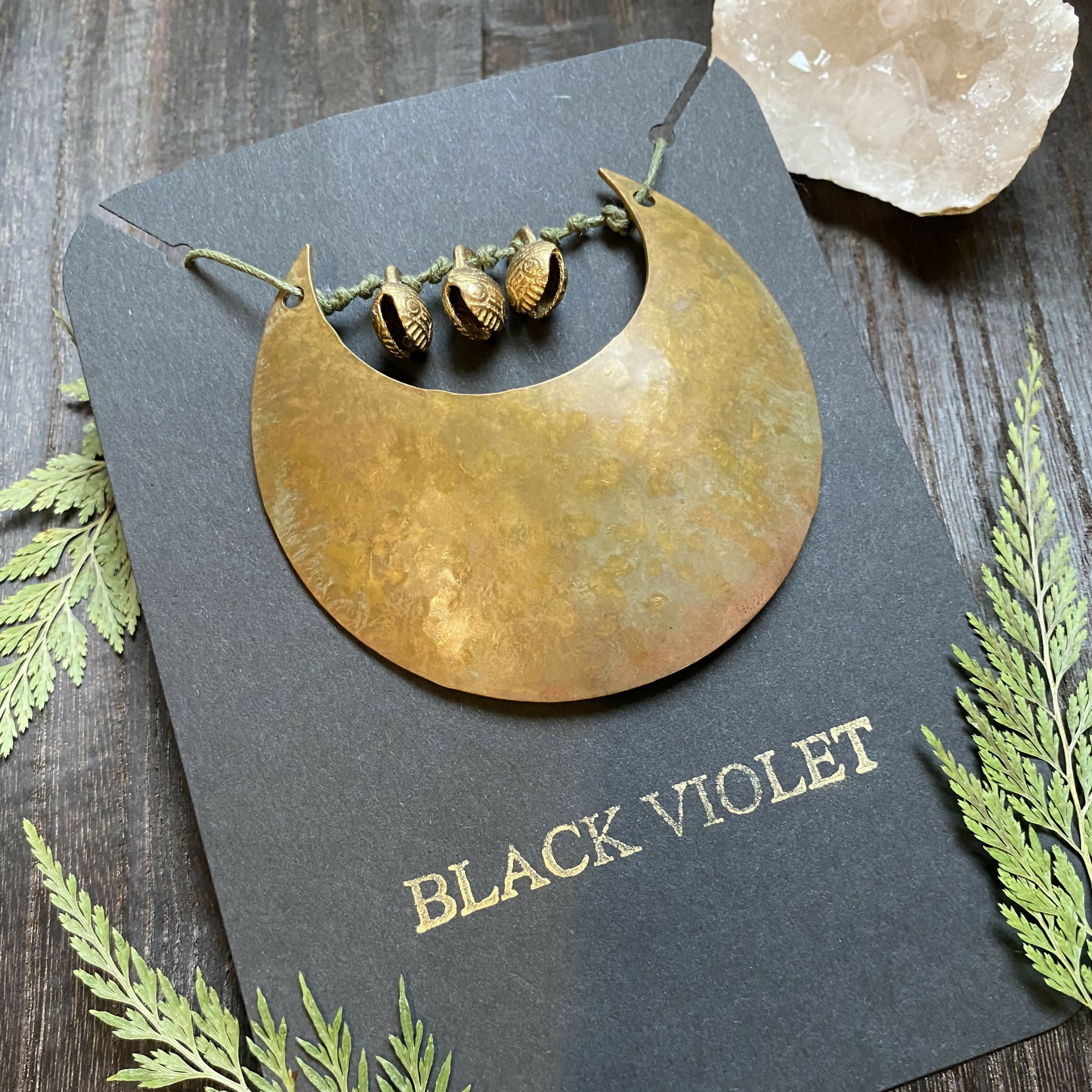 LONG BRASS HALF MOON NECKLACE ON WAXED CORD