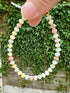 Shell and Hematite 'macaron' bracelet with clasp fastening